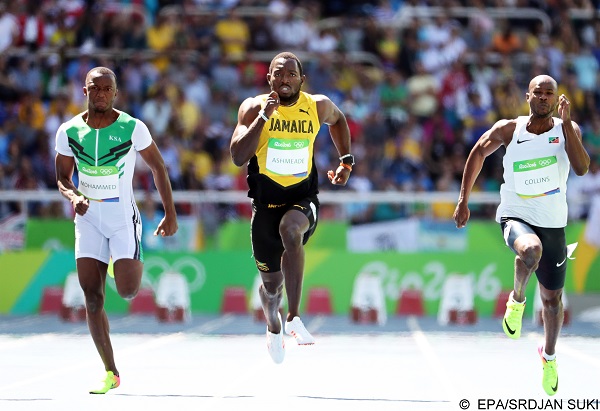 epa05480497 (L-R) Abdullah Abkar Mohammed of Saudi Arabia, Nickel Ashmeade of Jamaica, and Kim Collins of Saint Kitts and Nevis compete during the men's 100m heats of the Rio 2016 Olympic Games Athletics, Track and Field events at the Olympic Stadium in Rio de Janeiro, Brazil, 13 August 2016.  EPA/SRDJAN SUKI