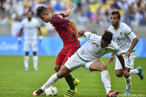 Ganso of Portugal (L) and Baghdad Bounedjah of Algeria (R) vie for the ball in action during a 2016 Rio Olympic Games match at Stadium Mineirao de Belo Horizonte, in Belo Horizonte, Brazil, 10 August 2016.  EPA/YURI EDMUNDO