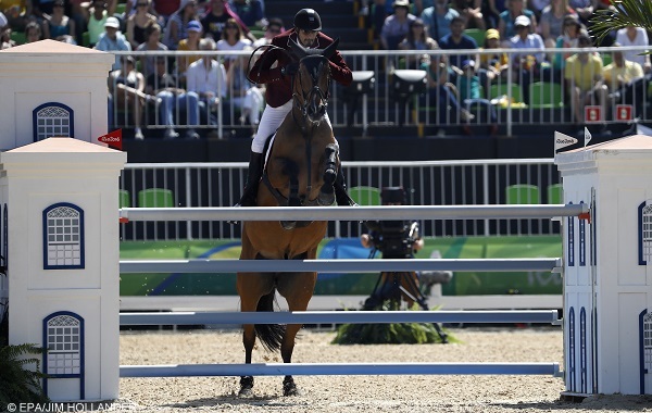epa05484211 Sheikh Ali Al Thani of Qater riding First Devision competes in the Jumping Individual 1st Qualifier competition of the Rio 2016 Olympic Games Equestrian events at the Olympic Equestrian Centre in Rio de Janeiro, Brazil, 14 August 2016.  EPA/JIM HOLLANDER