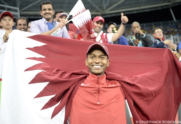 epa05491760 Mutaz Essa Barshim of Qatar celebrates after winning silver in the men's High Jump final of the Rio 2016 Olympic Games Athletics, Track and Field events at the Olympic Stadium in Rio de Janeiro, Brazil, 16 August 2016.  EPA/FRANCK ROBICHON