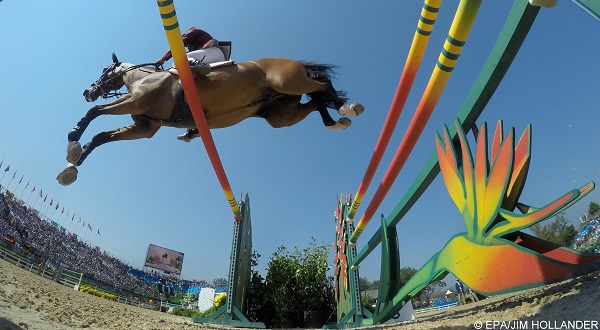 epa05494249 Bassem Hassan Mohammed from Qatar riding Dejavu jumps a double rail fence during the Jumping Individual 3rd qualifier competition of the Rio 2016 Olympic Games Equestrian events at the Olympic Equestrian Centre in Rio de Janeiro, Brazil, 17 August 2016.  EPA/JIM HOLLANDER