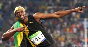 epa05485905 Usain Bolt of Jamaica celebrates after winning the men's 100m final of the Rio 2016 Olympic Games Athletics, Track and Field events at the Olympic Stadium in Rio de Janeiro, Brazil, 14 August 2016.  EPA/SRDJAN SUKI
