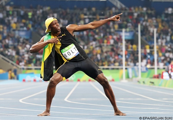 epa05485902 Usain Bolt of Jamaica celebrates after winning the men's 100m final of the Rio 2016 Olympic Games Athletics, Track and Field events at the Olympic Stadium in Rio de Janeiro, Brazil, 14 August 2016.  EPA/SRDJAN SUKI