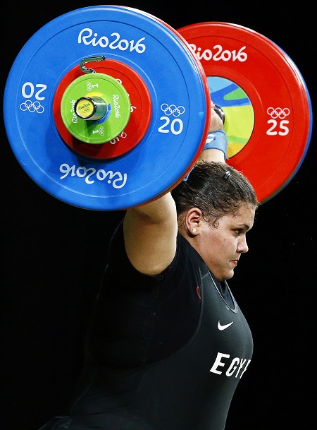 epa05485341 Shaimaa Haridy of Egypt competes during the women's +75kg category of the Rio 2016 Olympic Games Weightlifting events at the Riocentro in Rio de Janeiro, Brazil, 14 August 2016.  EPA/LARRY W. SMITH