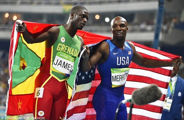 epa05486126 Kirani James (L) of Grenada celebrates with third placed Lashawn Merritt (R) of the USA after winning the silver medal in the men's 400m final of the Rio 2016 Olympic Games Athletics, Track and Field events at the Olympic Stadium in Rio de Janeiro, Brazil, 14 August 2016.  EPA/FRANCK ROBICHON