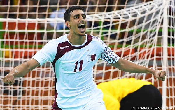 epa05461259 Abdulrazzaq Murad of Qatar celebrates after scoring a goal during the men's Handball preliminary round game between Croatia and Qatar at the Rio 2016 Olympic Games at the Future Arena in the Olympic Park in Rio de Janeiro, Brazil, 07 August 2016.  EPA/MARIJAN MURAT