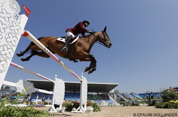 epa05493896 Ali Yousef Al Rumaihi of Qatar riding Gunder reacts after performing in the  Jumping Individual 3rd qualifier competition of the Rio 2016 Olympic Games Equestrian events at the Olympic Equestrian Centre in Rio de Janeiro, Brazil, 17 August 2016.  EPA/JIM HOLLANDER
