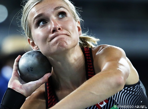 epa05479041 Brianne Theisen Eaton of Canada competes in the Shot Put portion of the Heptathlon of the Rio 2016 Olympic Games Athletics, Track and Field events at the Olympic Stadium in Rio de Janeiro, Brazil, 12 August 2016.  EPA/DIEGO AZUBEL