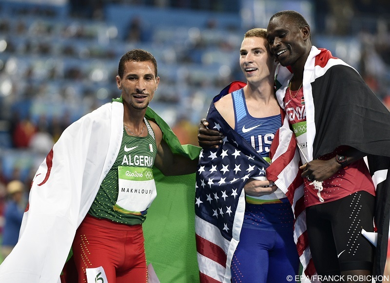epa05488638 Winner David Lekuta Rudisha (R) of Kenya celebrates with second placed Taoufik Makhloufi of Algeria (L) and third placed Clayton Murphy of the USA after the men's 800m final of the Rio 2016 Olympic Games Athletics, Track and Field events at the Olympic Stadium in Rio de Janeiro, Brazil, 15 August 2016.  EPA/FRANCK ROBICHON