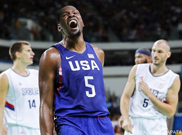 epa05505608 Kevin Durant (C) of the USA reacts during the men's Basketball gold medal game between Serbia and the USA at the Rio 2016 Olympic Games at the Carioca Arena 1 in the Olympic Park in Rio de Janeiro, Brazil, 21 August 2016.  EPA/JORGE ZAPATA